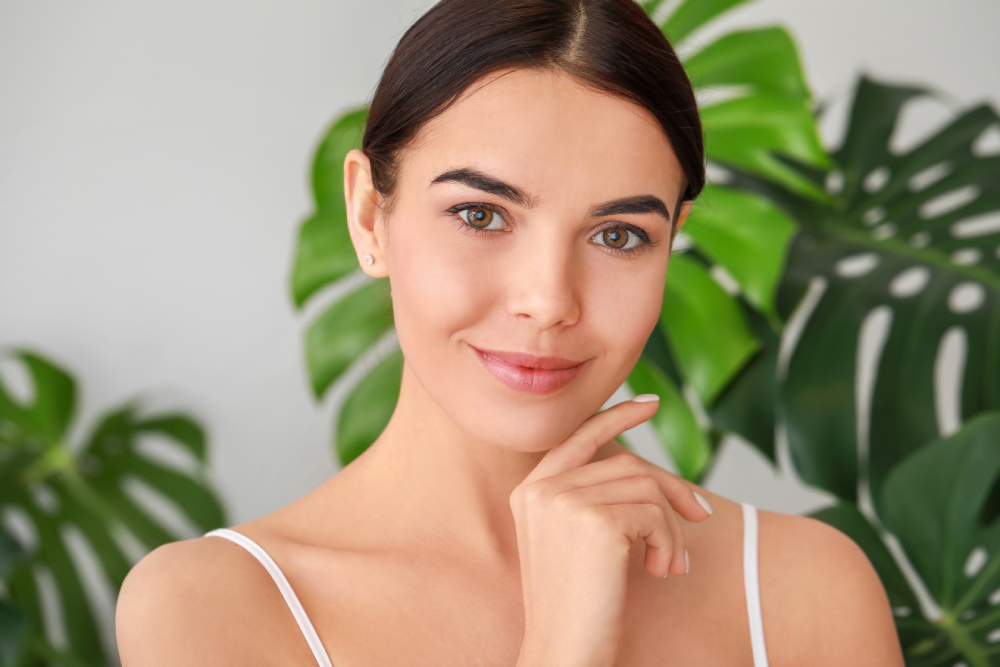 Woman with healthy, radiant skin after a med spa treatment.